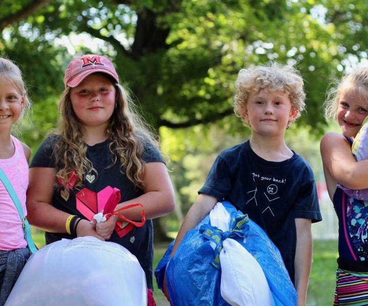 campers with sleeping bags