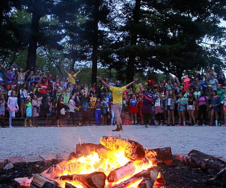 group of people at campfire